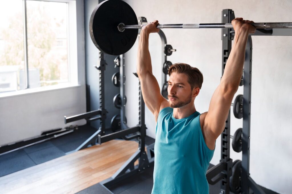 Man training at the gym for bodybuilding